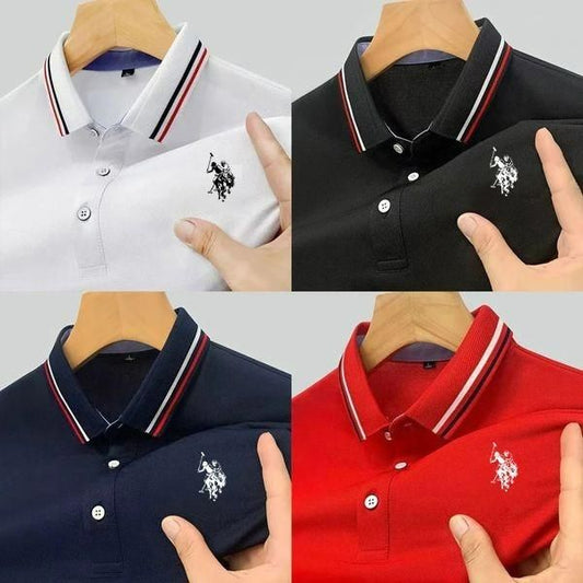 Four different colored polo shirts with a brand logo on a gray background